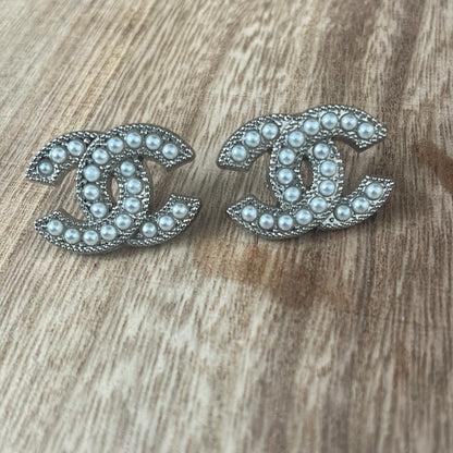 Silver and Pearl with ribbon edging studs